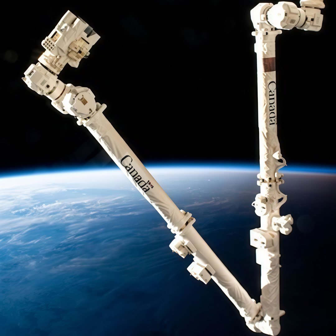 The same arm after a 4× CraterView.ai enhancement: the joints, the cabling and the lettering on the boom resolved